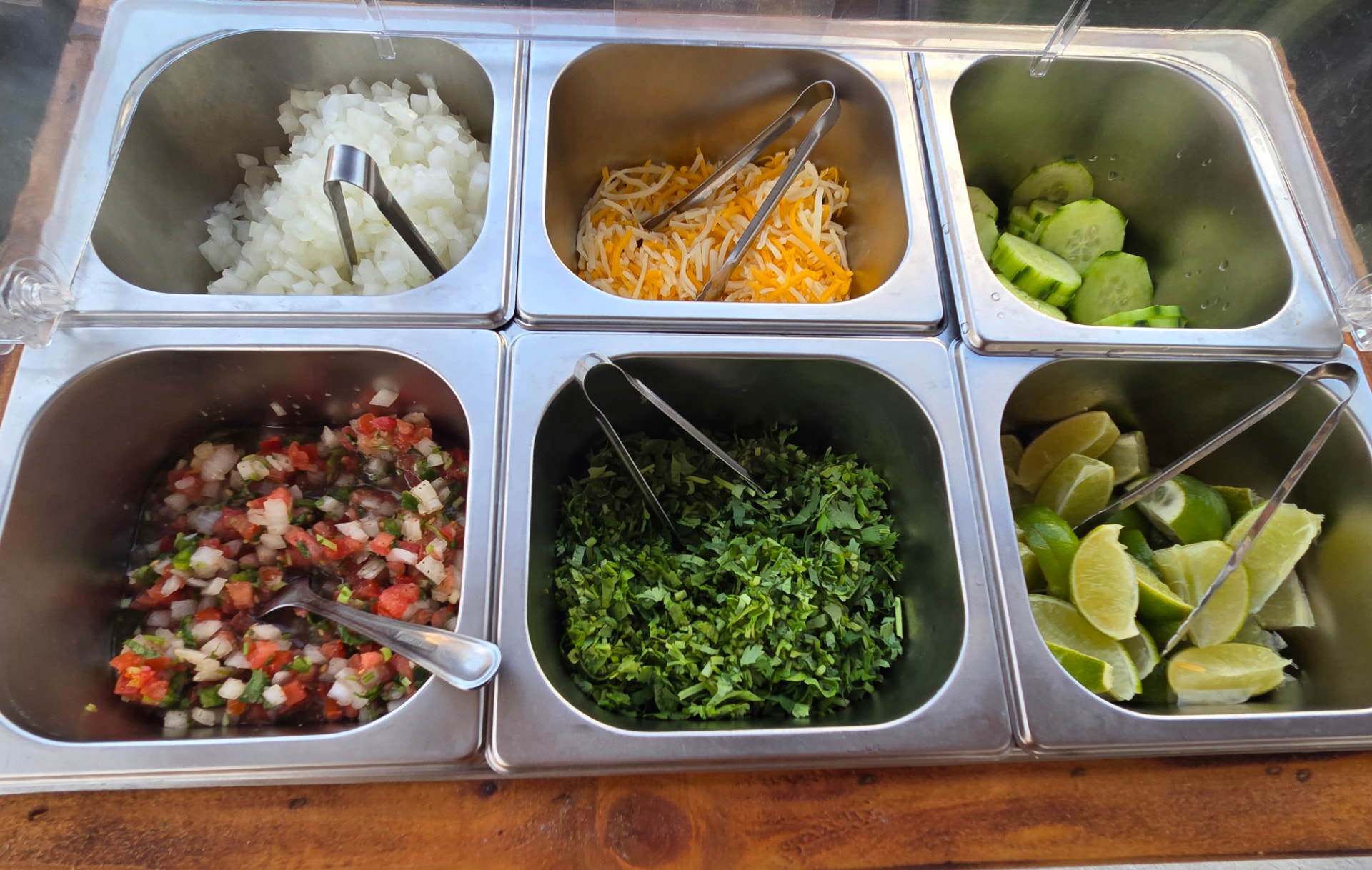 Fresh pico de gallo, cilantro, onions, cheese and limes